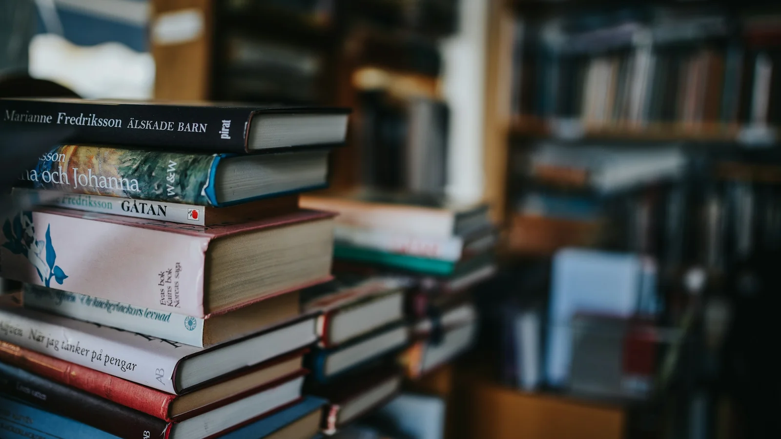 Books filling a wooden bookshelf